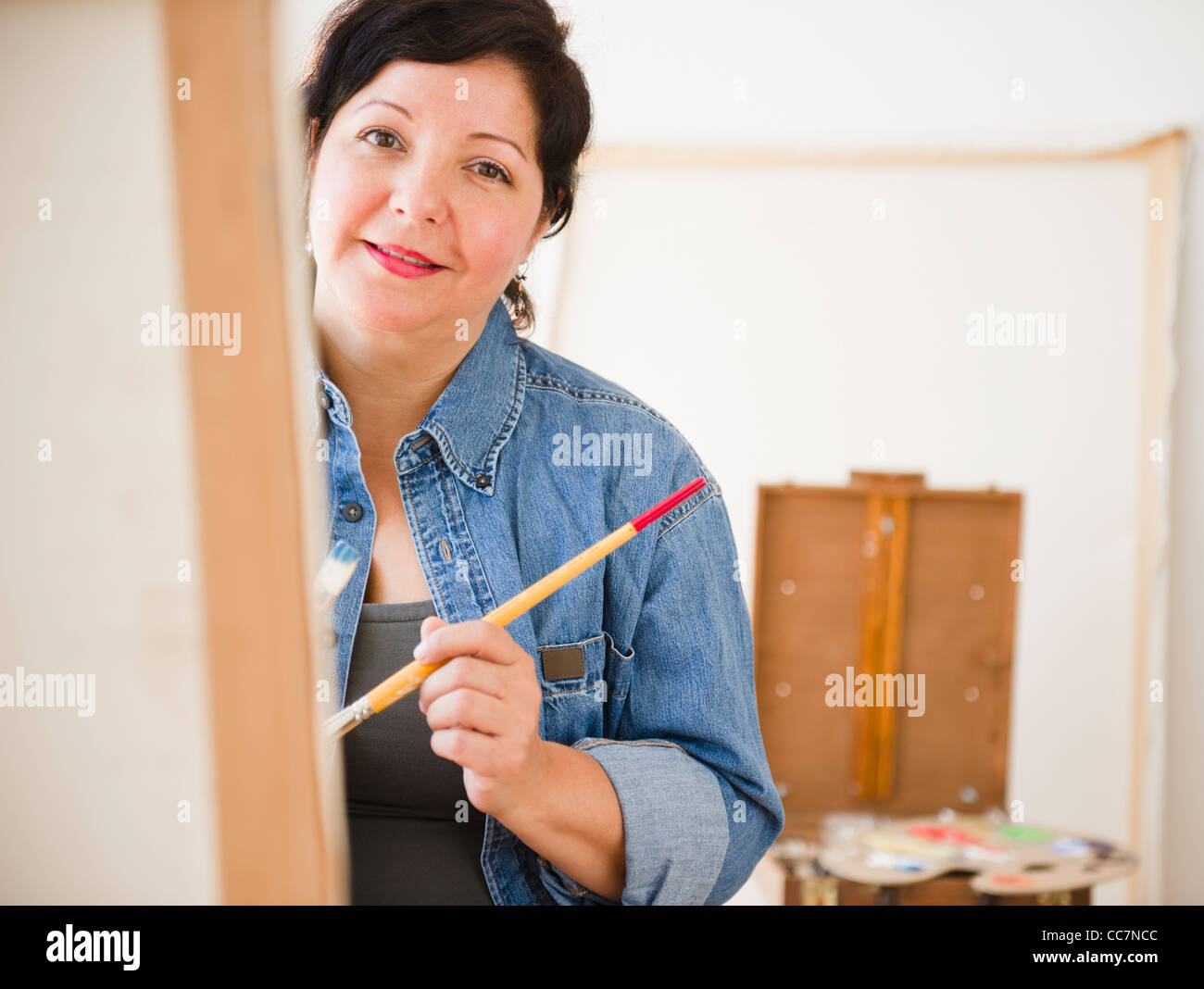 Donna ispanica dipinto su tela Foto Stock