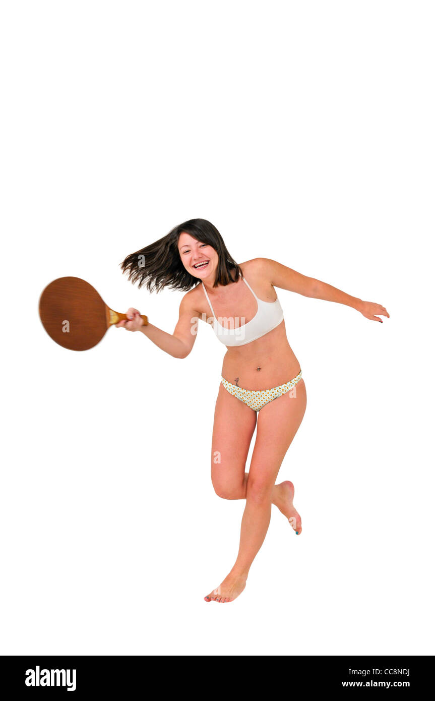 Giovane donna in un bikini gioca raquetball Foto Stock
