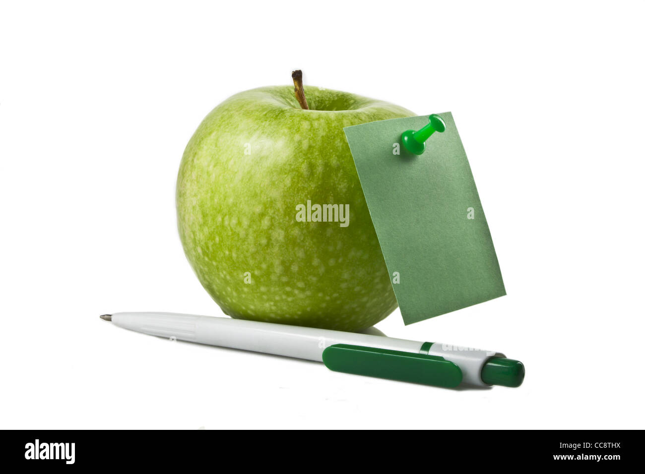 Foto di un Apple con un adesivo e una penna Foto Stock
