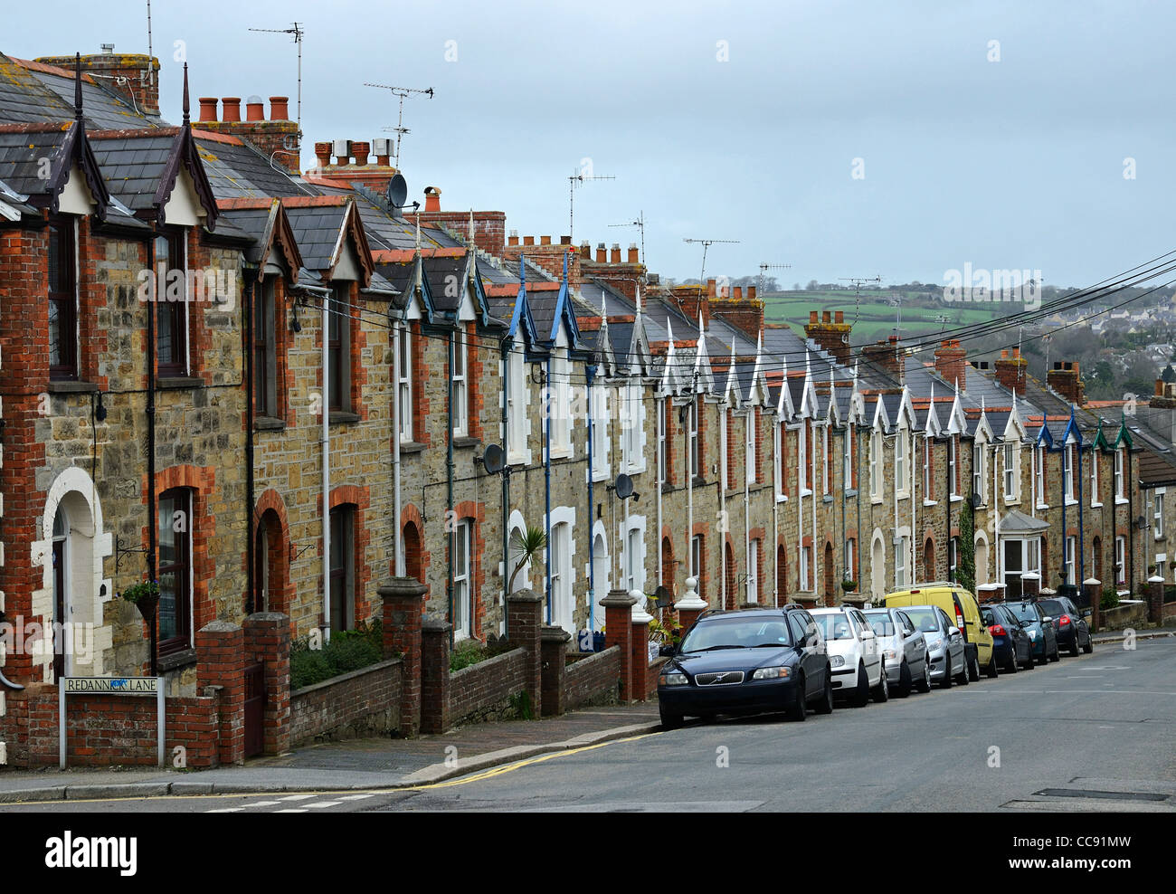 Una fila di case a schiera in Truro, Cornwall, Regno Unito Foto Stock