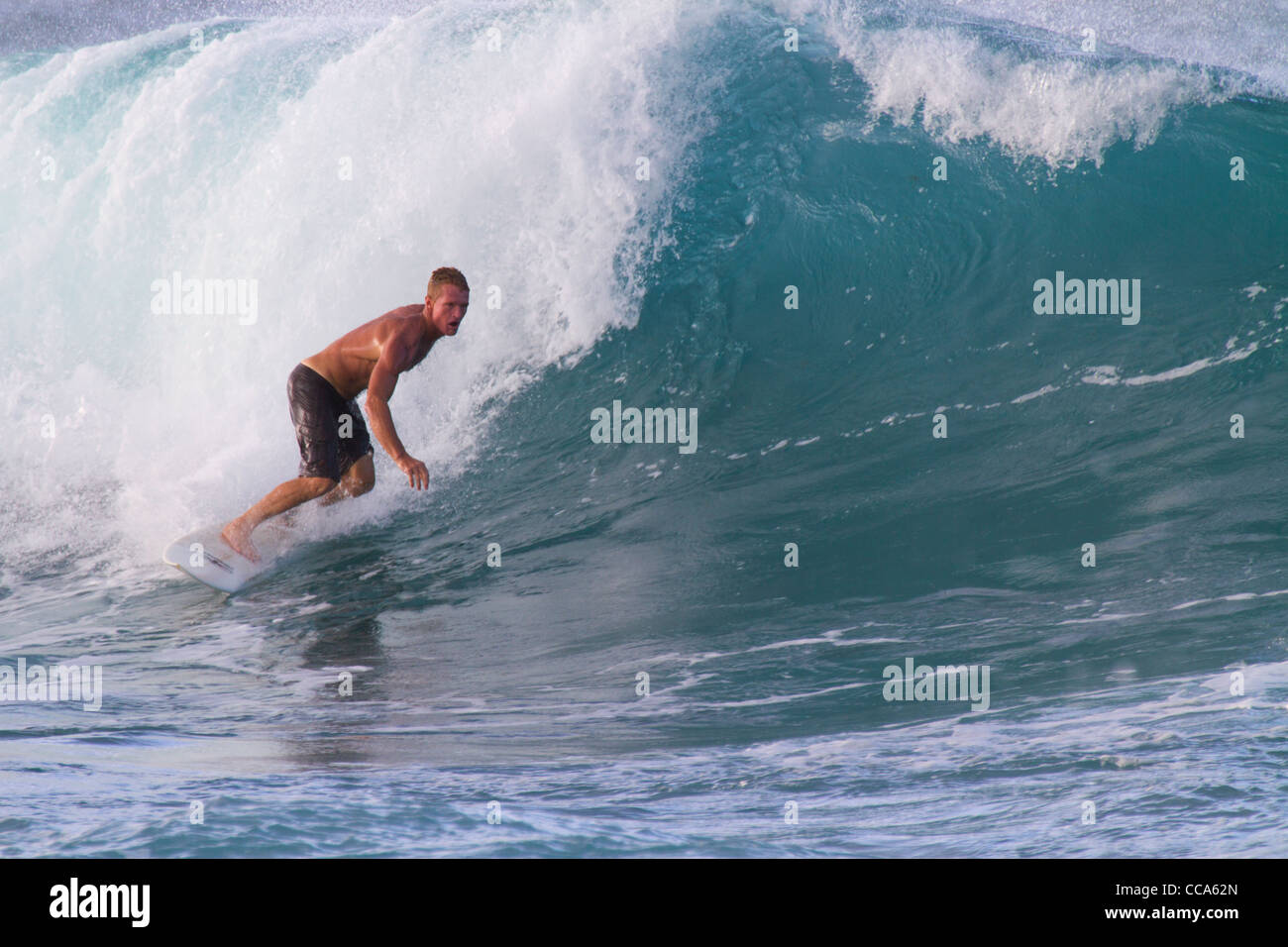 Surfisti a Ho'okipa Beach, Maui, Hawaii. Foto Stock