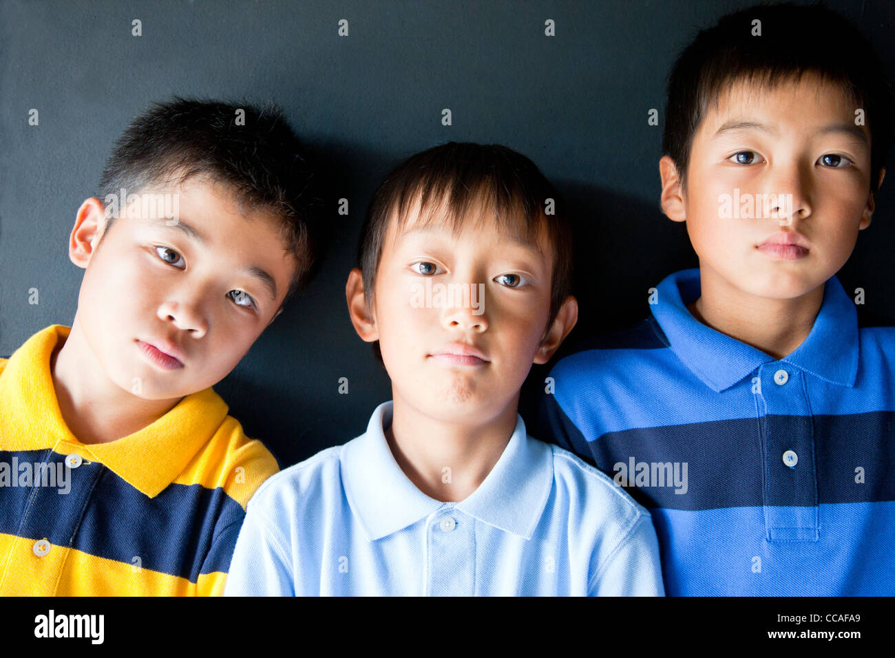 Ritratto di tre ragazzi Foto Stock