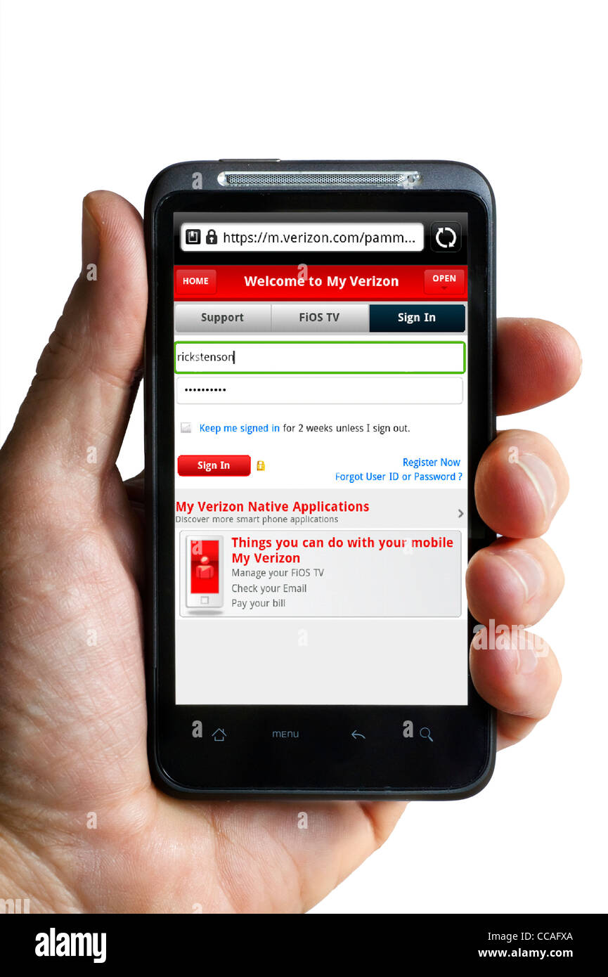 La gestione di un telefono Verizon conto online tramite uno smartphone Foto Stock