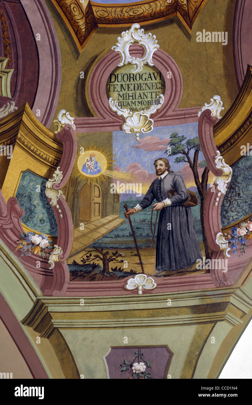 Scene della vita di Sant Ignazio di Loyola, immagine sul soffitto della chiesa Foto Stock