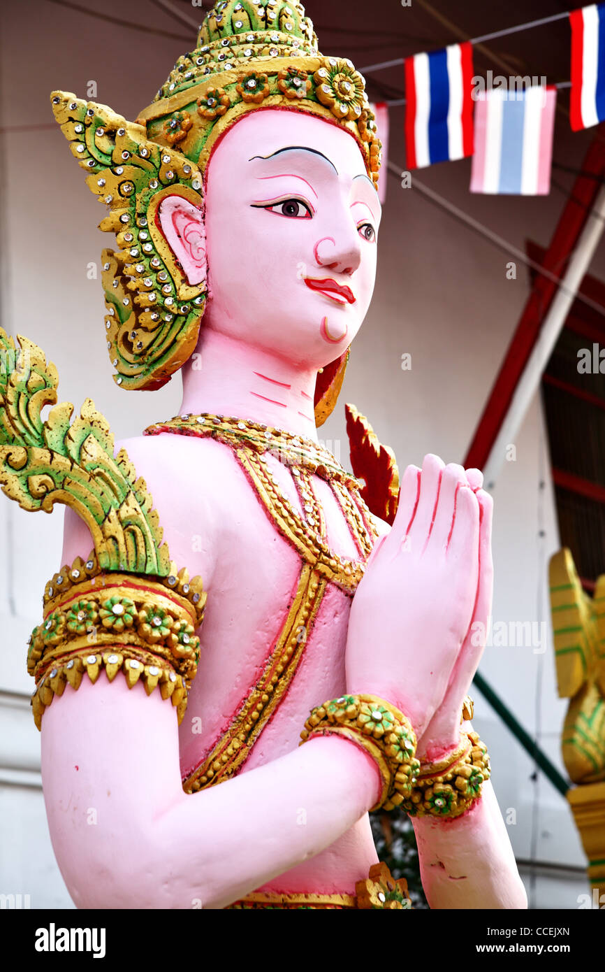 Kinnara statua - una sorta di Thai creatura mitologica Foto Stock