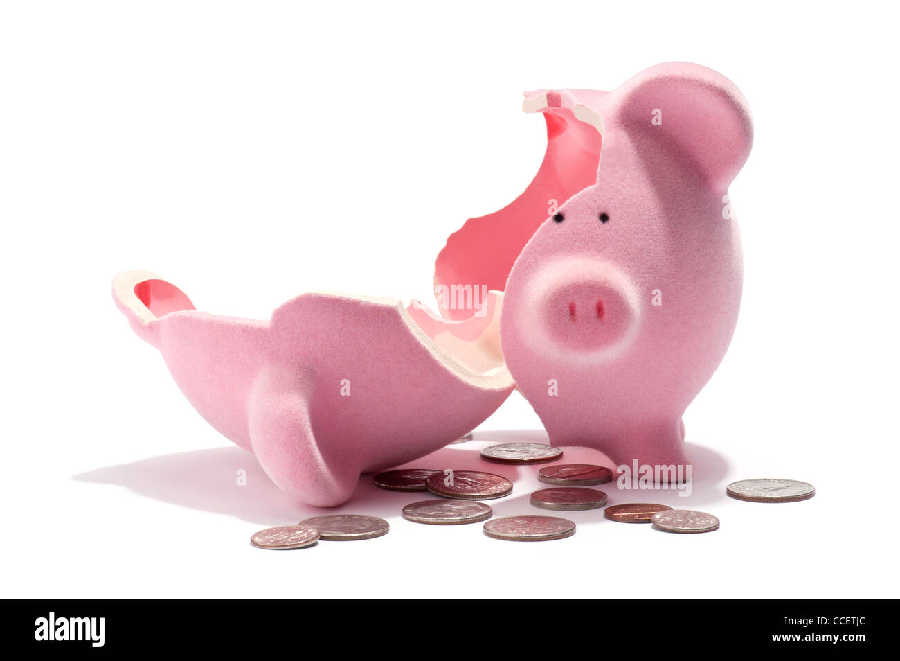 La rottura di un salvadanaio e American monete Foto Stock