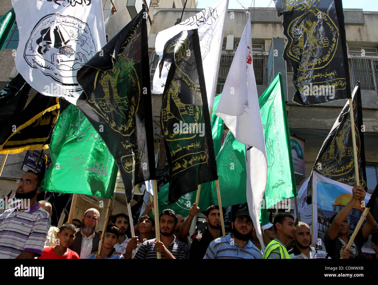 Palestinesi prendere parte a una manifestazione di protesta come esse segnano Quds di giorno o di Gerusalemme giorno nella città di Gaza, Venerdì 26 Agosto, 2011. Alla fine il leader iraniano Ayatollah Khomeni segnalata l'ultimo venerdì del islamica il mese di digiuno del Ramadan come " al-Quds Day", una giornata di protesta per mostrare l importanza di Gerusalemme ai musulmani Foto Stock