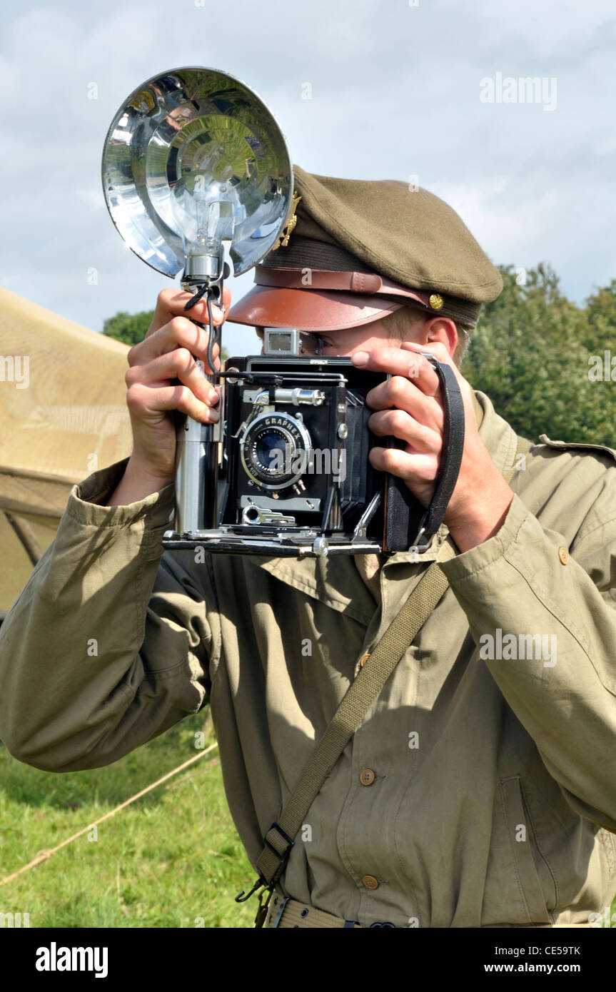 Velocità telecamera ​​Graphic (Graphex), scena ricostruzione, US Army soldato, la liberazione della città di Oisseau (Mayenne, Francia). Foto Stock