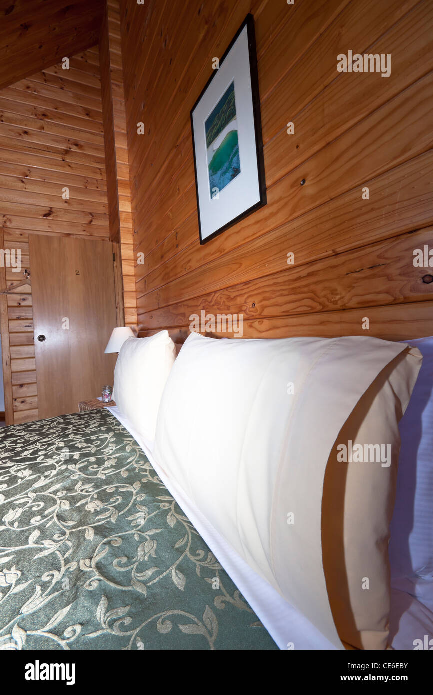 Dettaglio del bello e caldo interno del mountain lodge appartamento. Fox Glacier Lodge, Fox Glacier, Costa Ovest, South Island, in Nuova Zelanda. Foto Stock