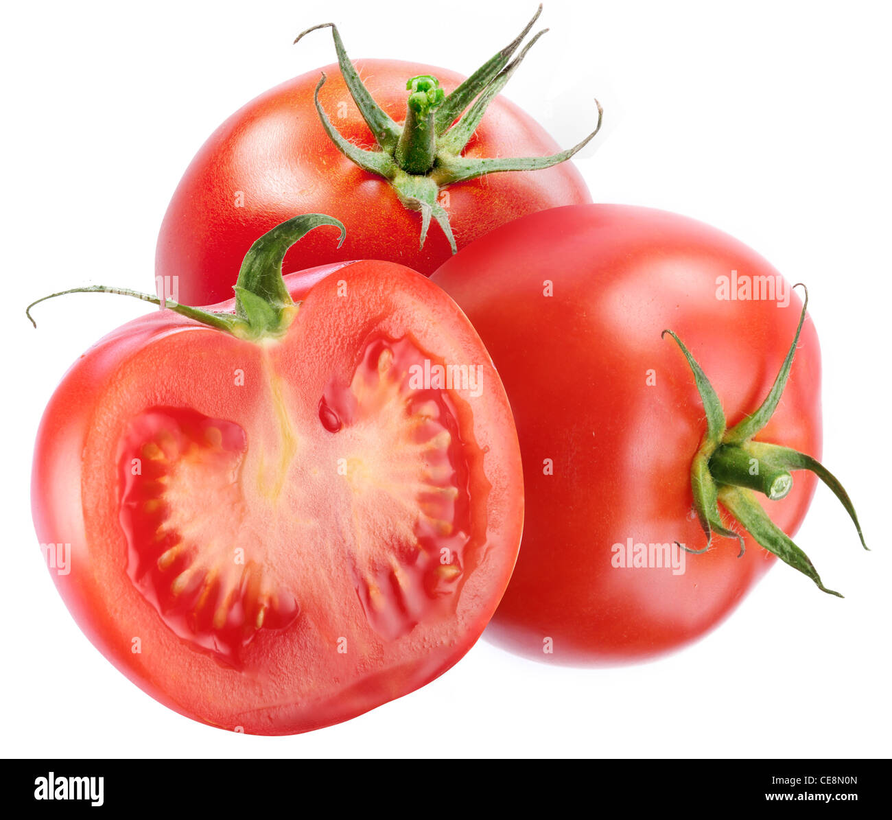 Due pomodoro con una fetta su uno sfondo bianco. Foto Stock