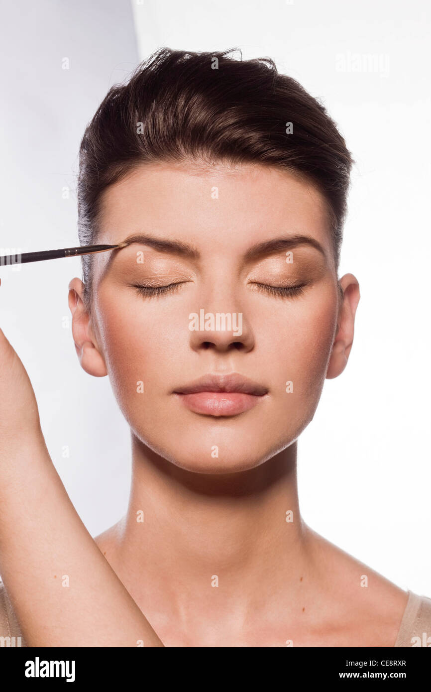 Trucco delle sopracciglia Foto Stock