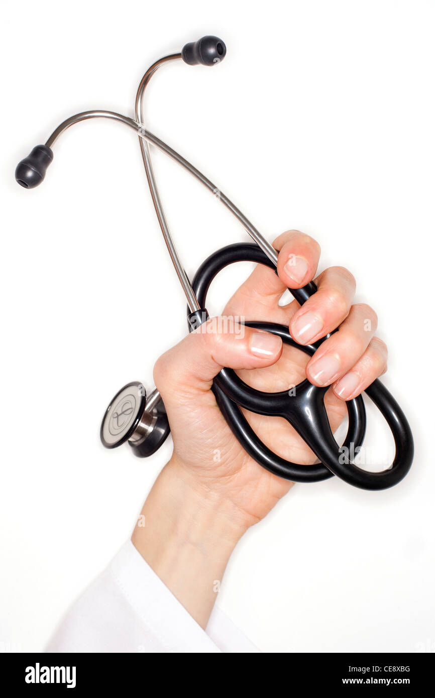 Modello rilasciato. Uno stetoscopio in un medico la mano. Foto Stock