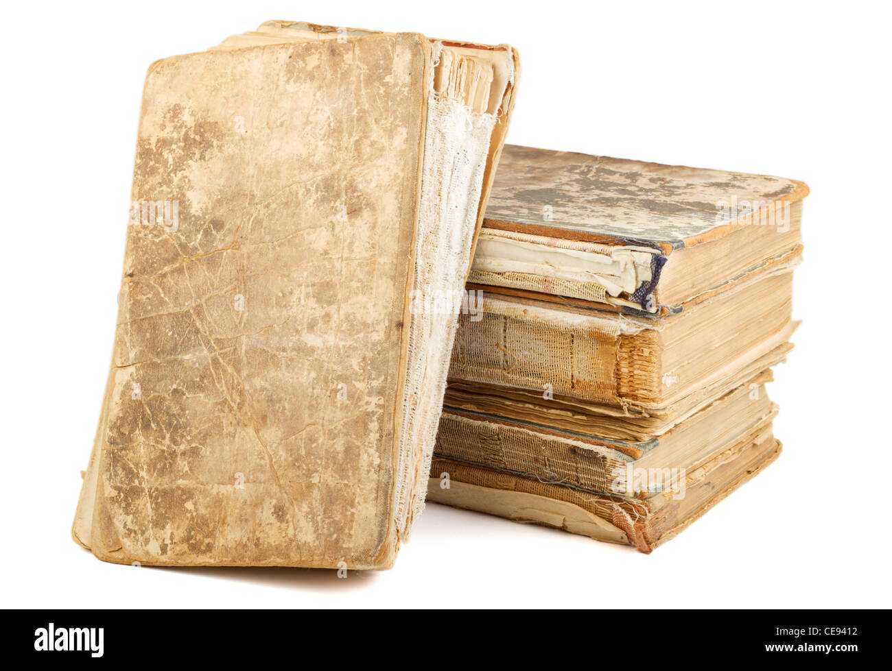 Libri antichi di diversa forma e colore. Isolato su sfondo bianco. Foto Stock