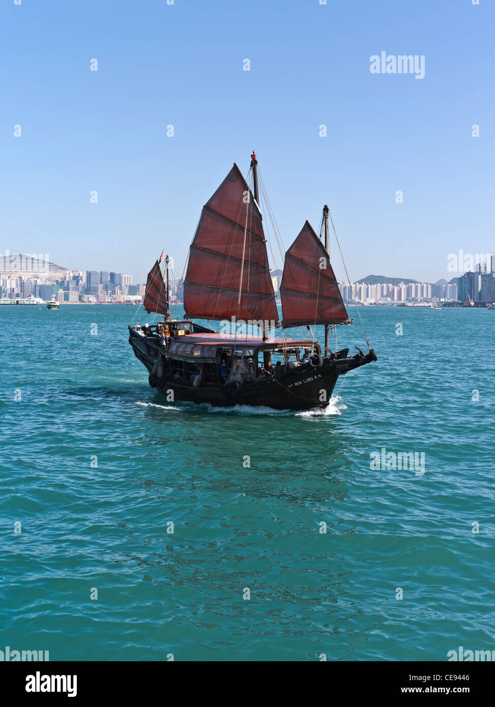dh Duk Ling Junk VICTORIA HARBOUR HONG KONG Tourist roba di rifiuto della vela rossa attrazione cinese turismo barca a vela veliero vele barca Foto Stock