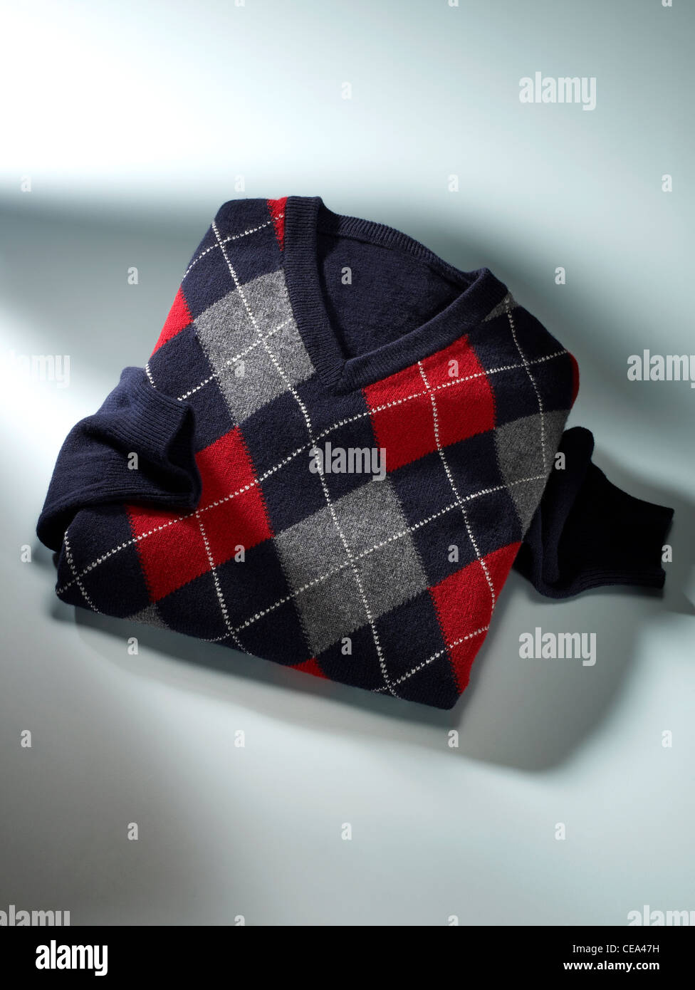 Ancora vita colpo di una mens v collo argyle il ponticello Foto Stock