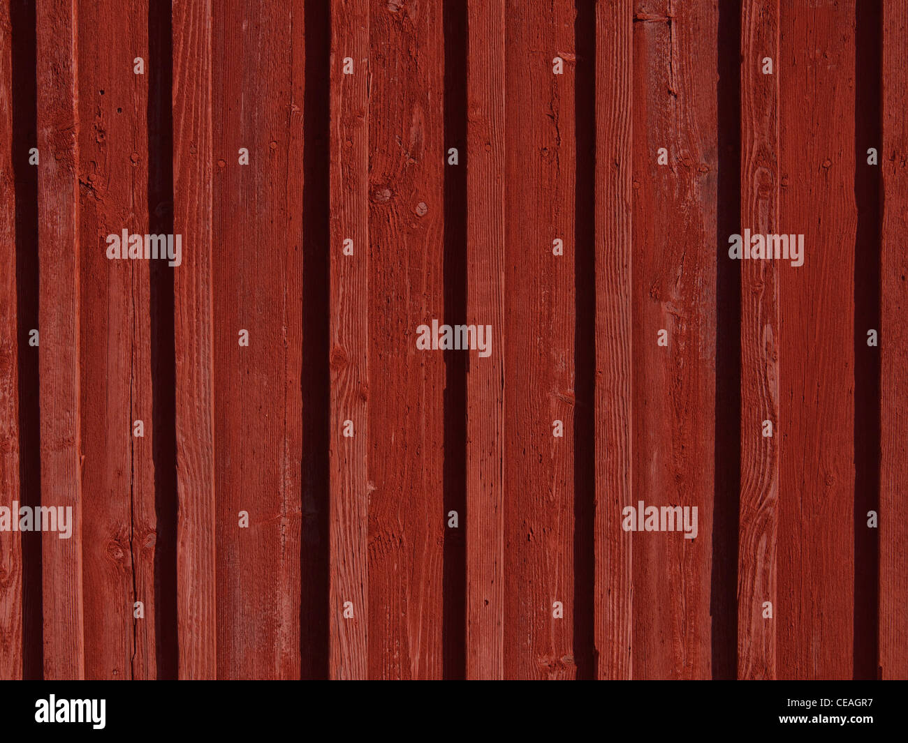 Scandinavo imbarcati in legno dipinti a muro con tradizionale falu vernice rossa. Foto Stock