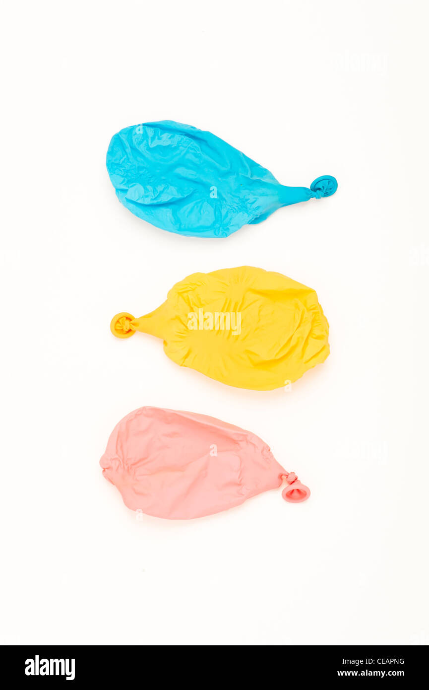 Tre palloncini sgonfi Foto Stock