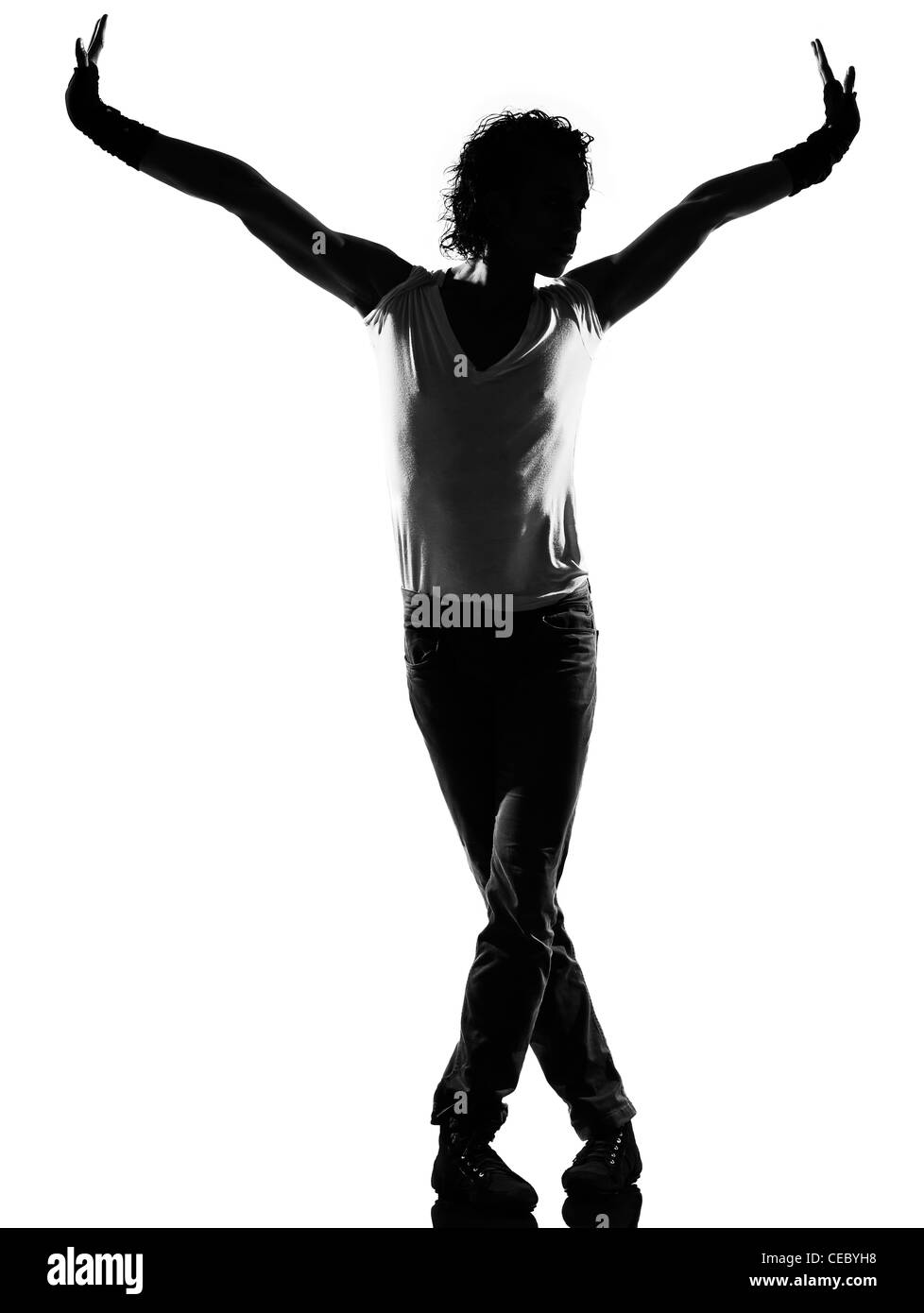 Lunghezza completa silhouette di un giovane ballerino di danza funky hip hop r&b su studio isolato sfondo bianco Foto Stock