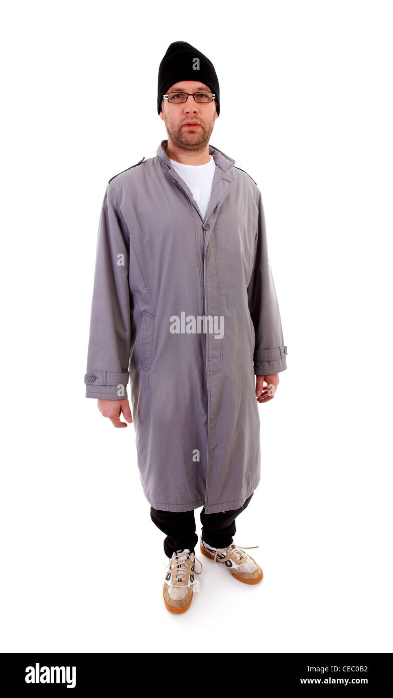 Maschio mendicante senzatetto in piedi su sfondo bianco Foto Stock