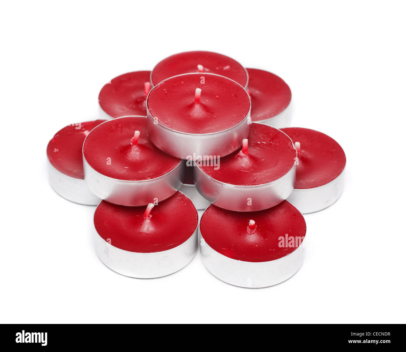 Tè rosso luci candele su sfondo bianco Foto Stock