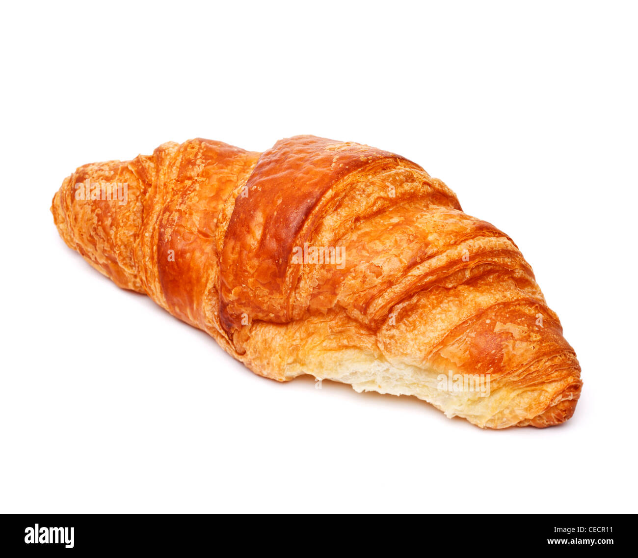 Croissant close up su sfondo bianco Foto Stock