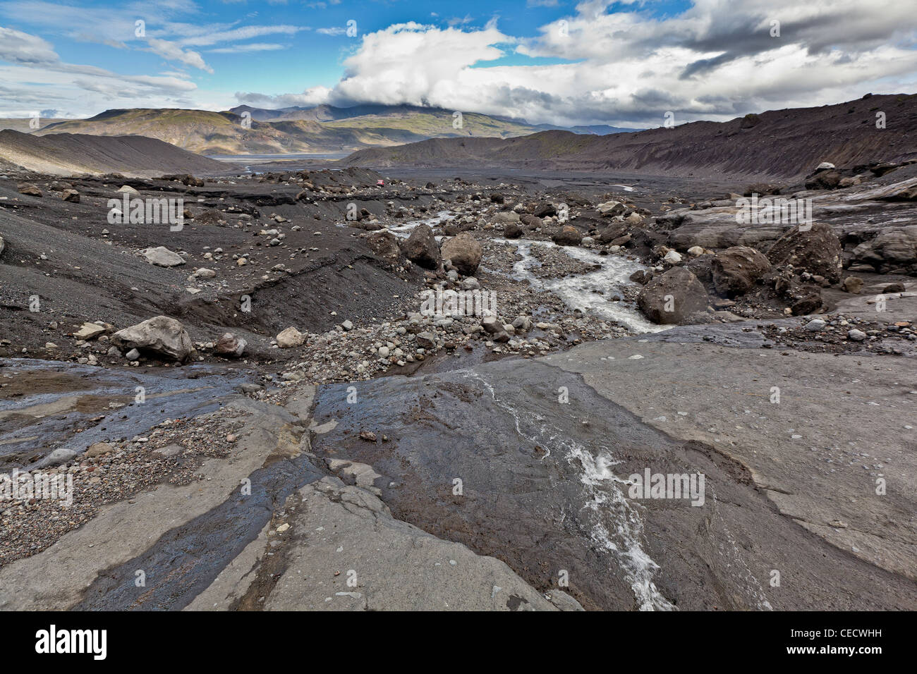 Riempito di cenere paesaggio glaciale, Gigjokull ghiacciaio, Islanda Foto Stock