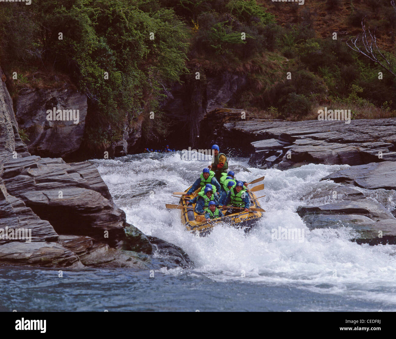 Rafting sul fiume Shotover, Queenstown, Regione di Otago, Isola del Sud, Nuova Zelanda Foto Stock