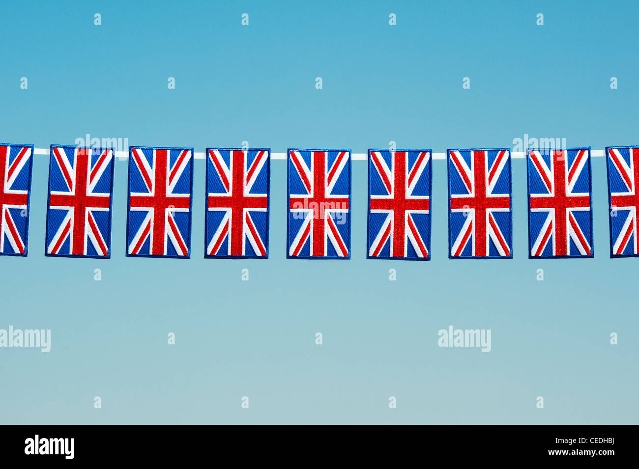 Union Jack flag patch ricamato configurazione contro un cielo blu Foto Stock