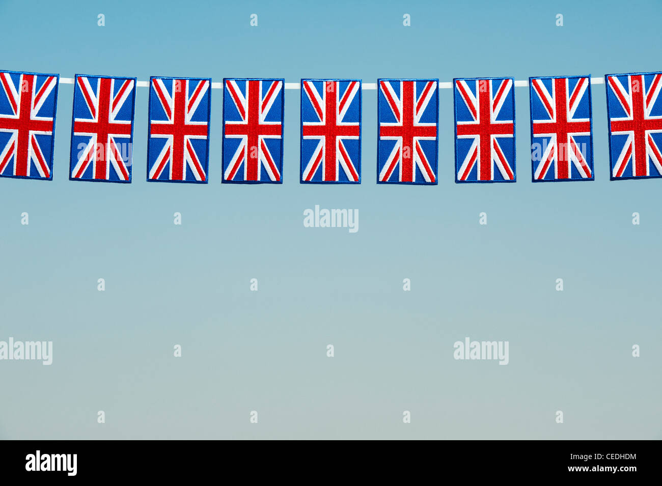 Union Jack flag patch ricamato configurazione contro un cielo blu Foto Stock
