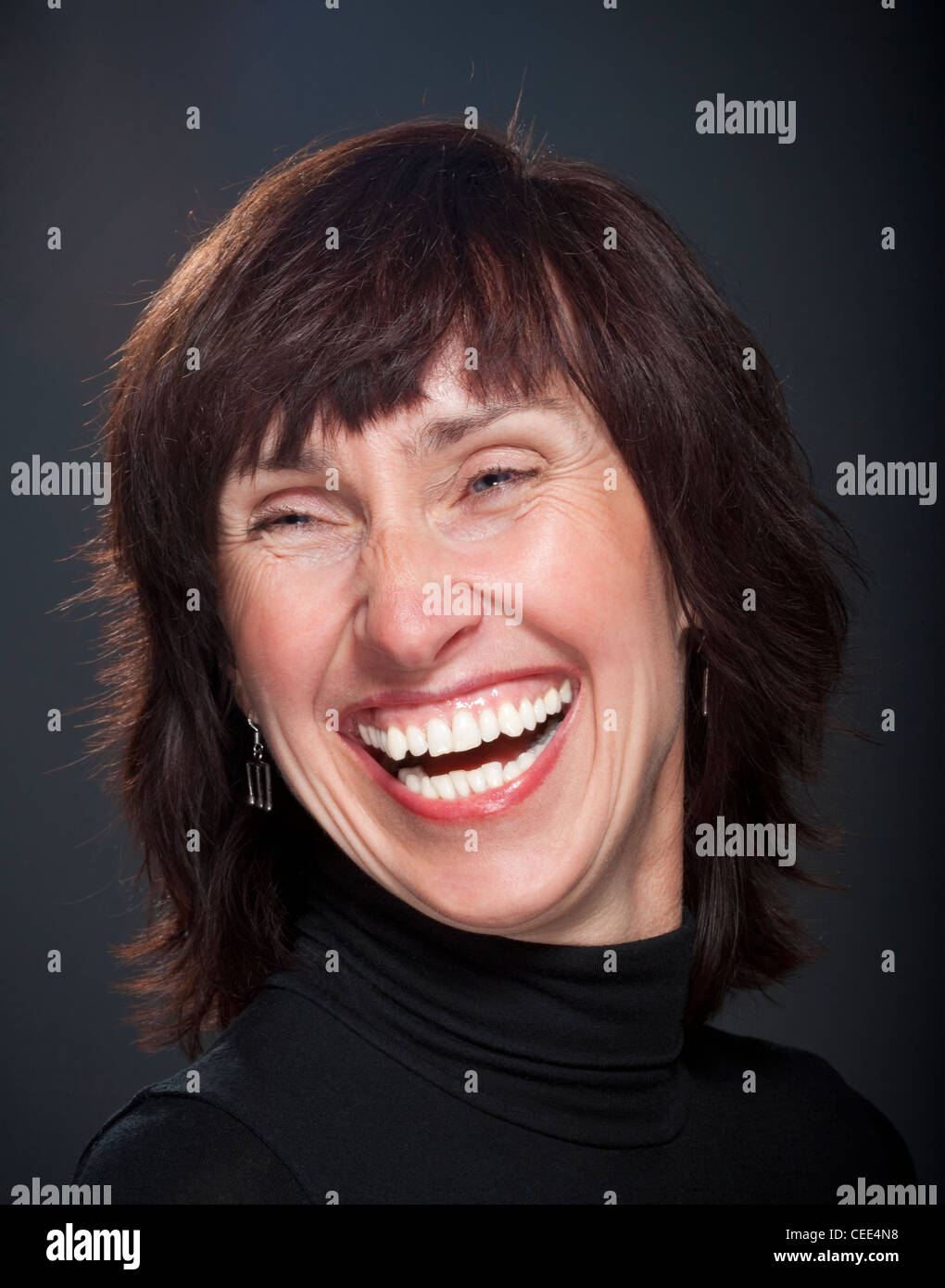 Ritratto di una donna di mezza età ridere Foto Stock
