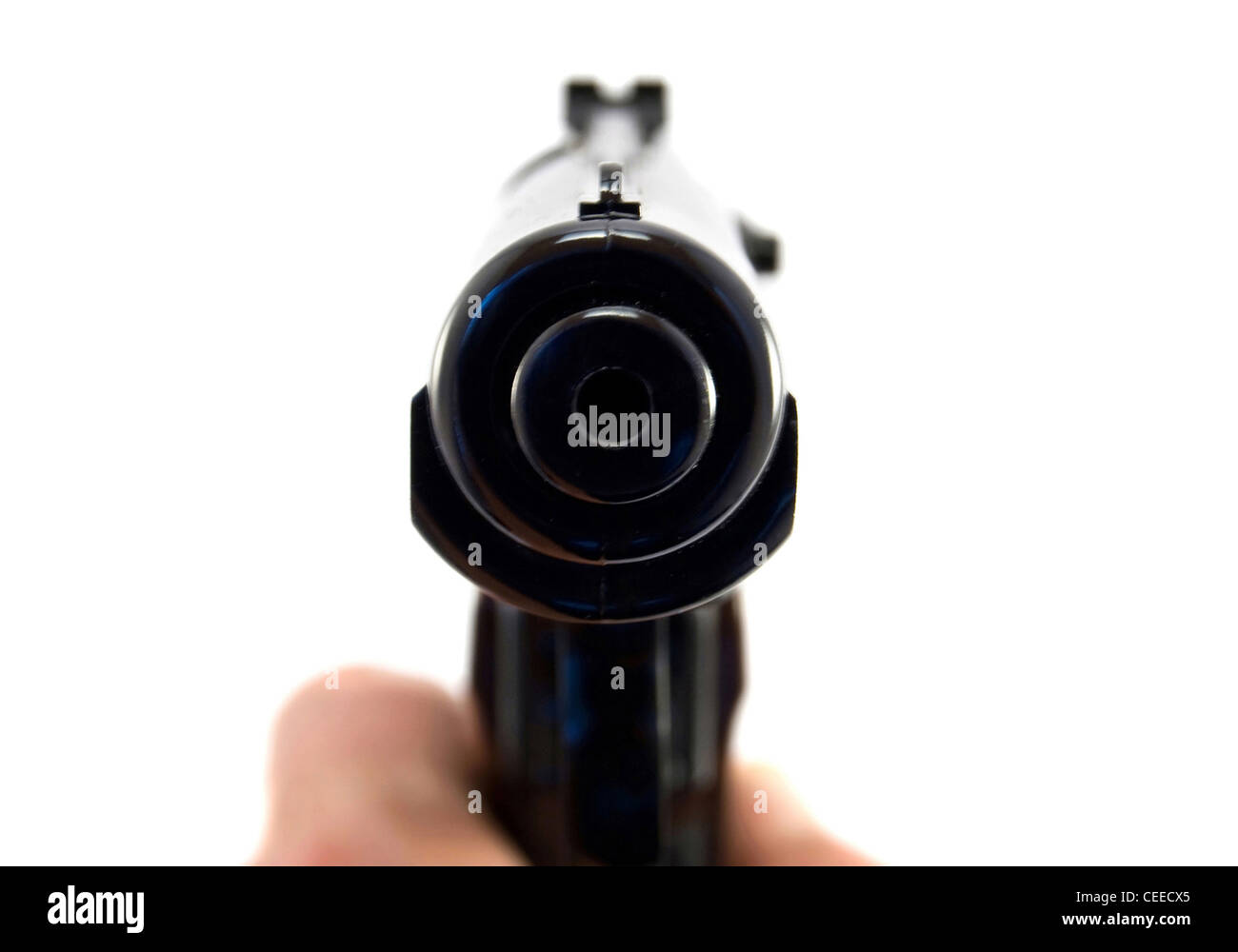 Pistola di puntamento in una mano Foto Stock