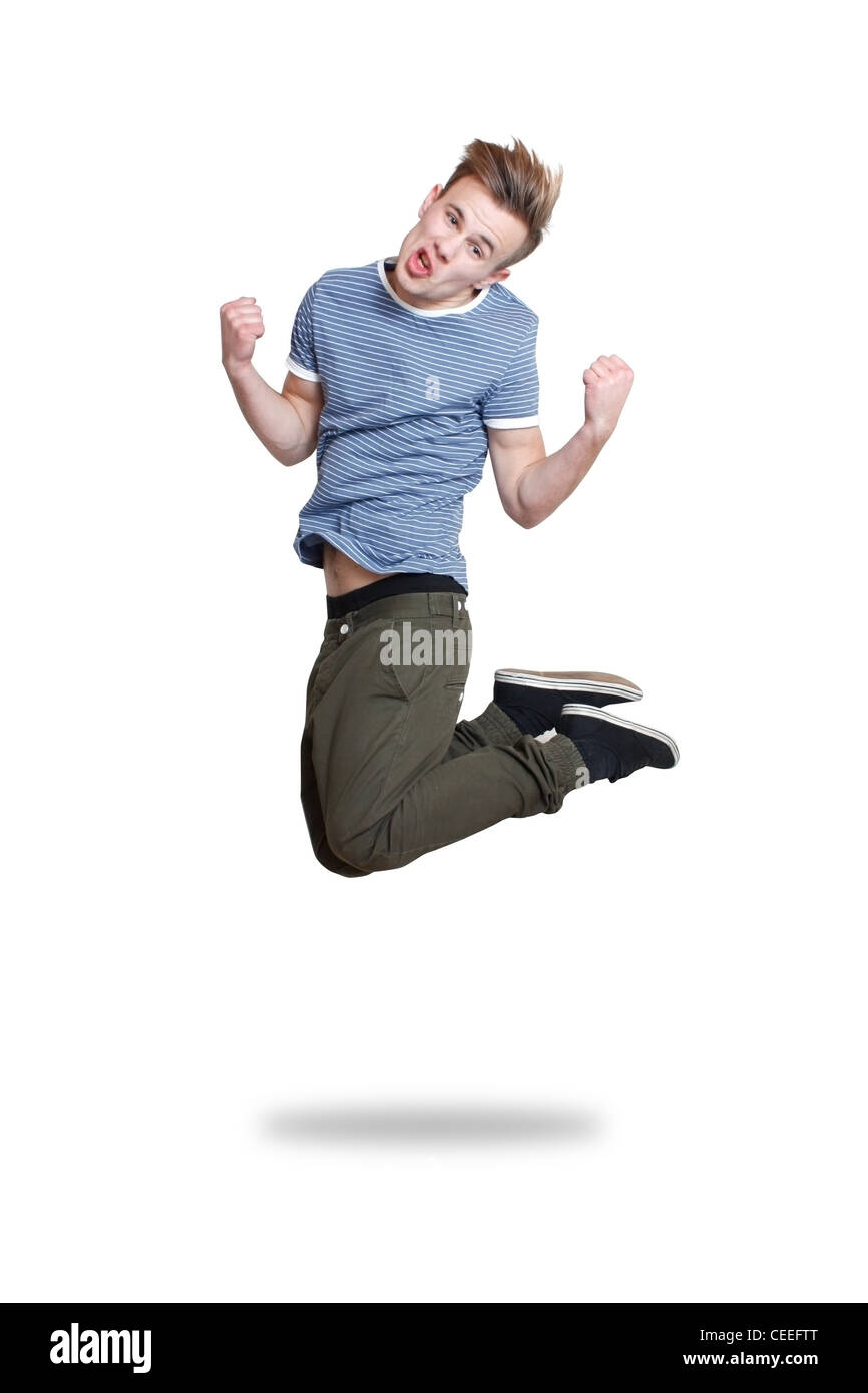 Un ragazzo salta con gioia Foto Stock
