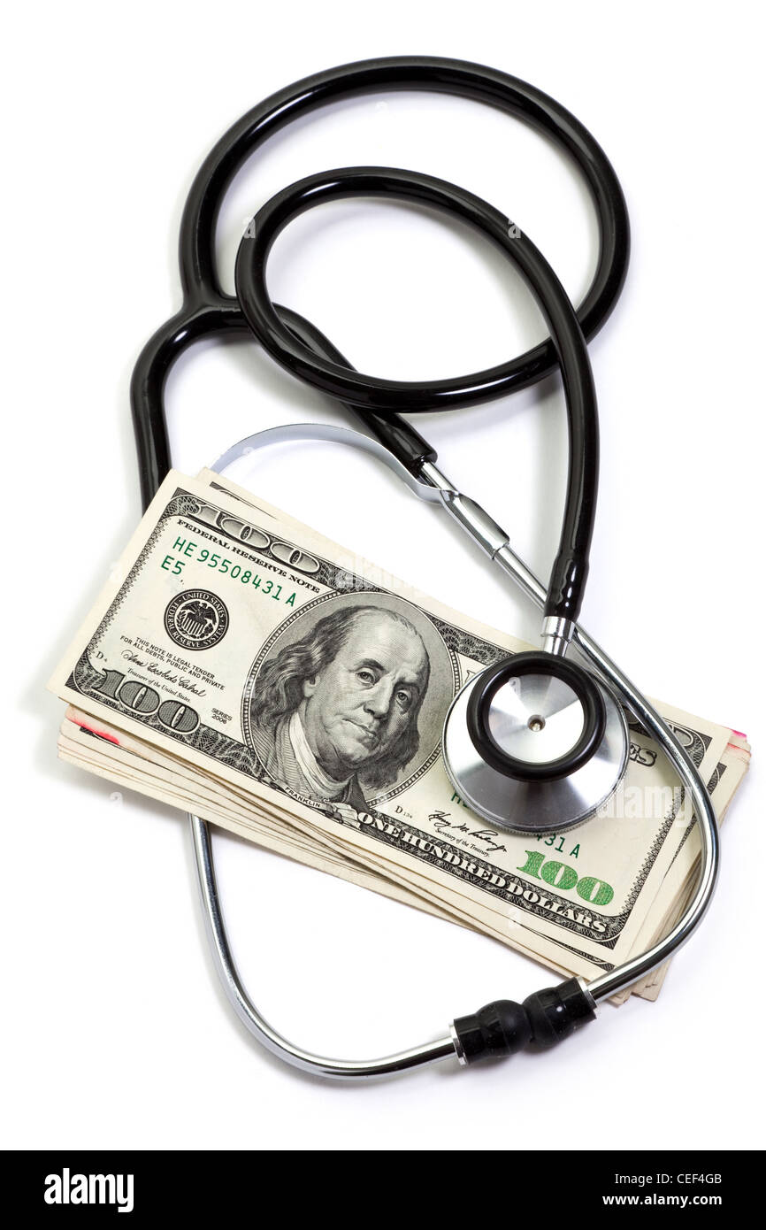 Lo stetoscopio e il dollaro, il concetto di salute finanziaria Foto Stock