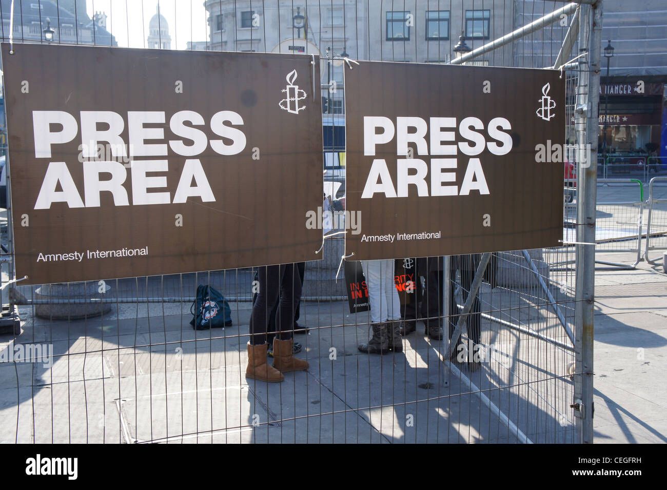 Premere il tasto area in corrispondenza di Amnesty International manifestazione a Londra a sostegno della primavera araba Foto Stock