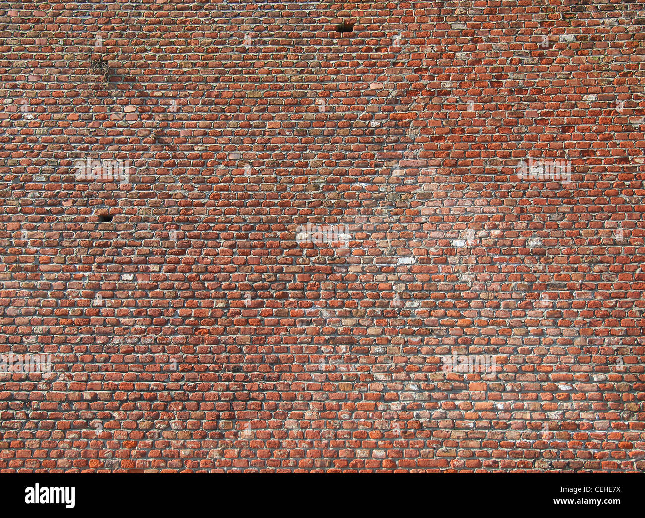 Red muro di mattoni utili come uno sfondo Foto Stock