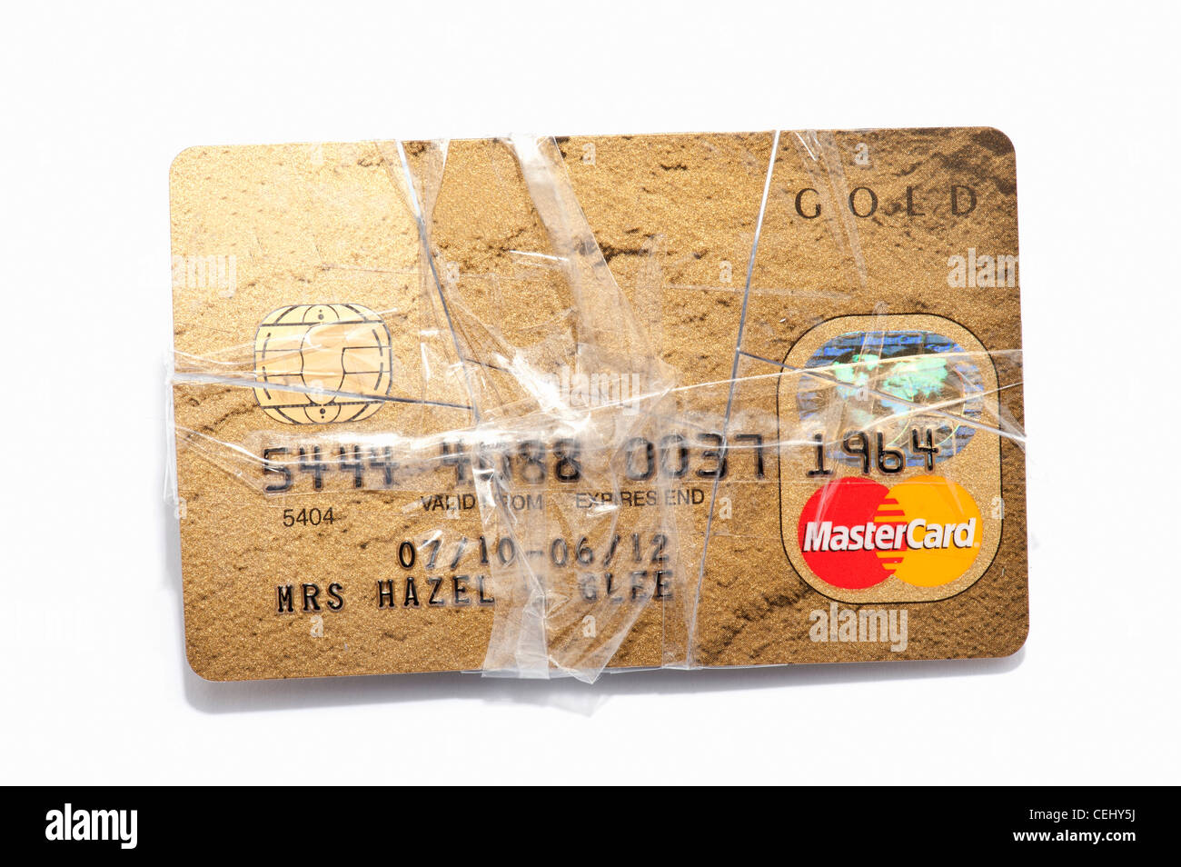 Una carta di credito insieme con nastro adesivo Foto stock - Alamy