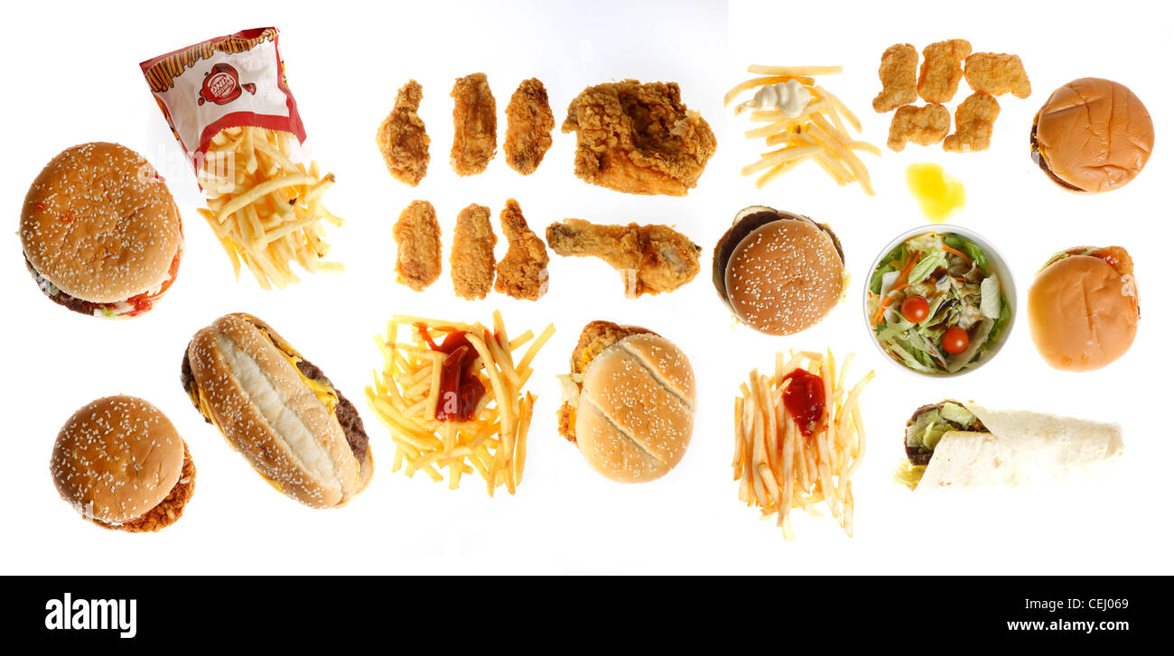 Nutrizione. La compilazione, la composizione di diversi fast food piatti. Hot Dog, Cheeseburger, kebab Turco, pizza, salsicce, sandwich. Foto Stock