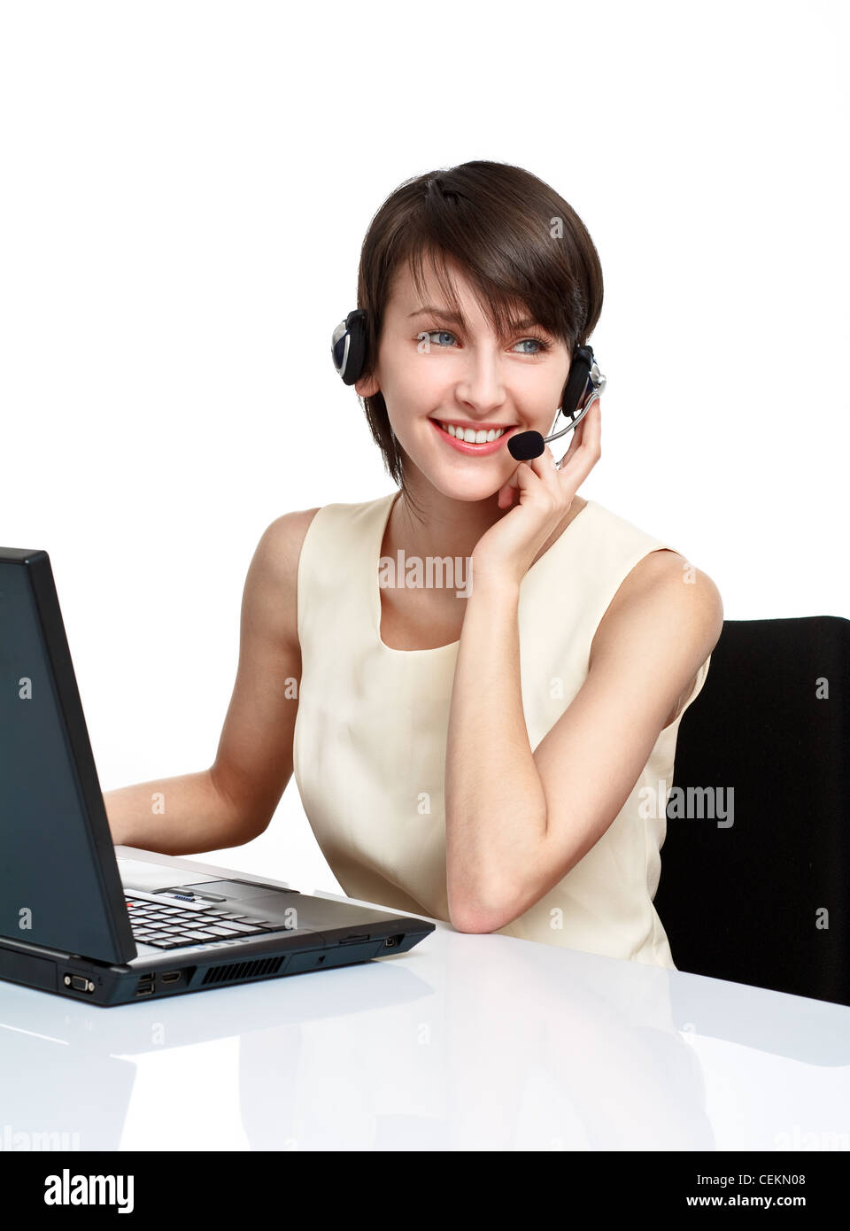 Donna sorridente operatore con auricolare (microfono e cuffie) Foto Stock