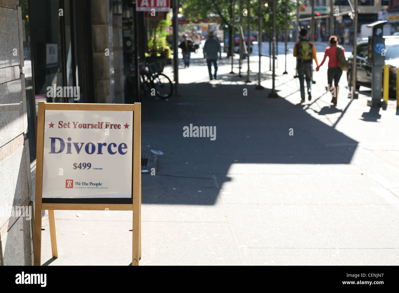Segno pubblicità divorzio per $499 su 14th Street a New York con la parole Liberatevi Foto Stock