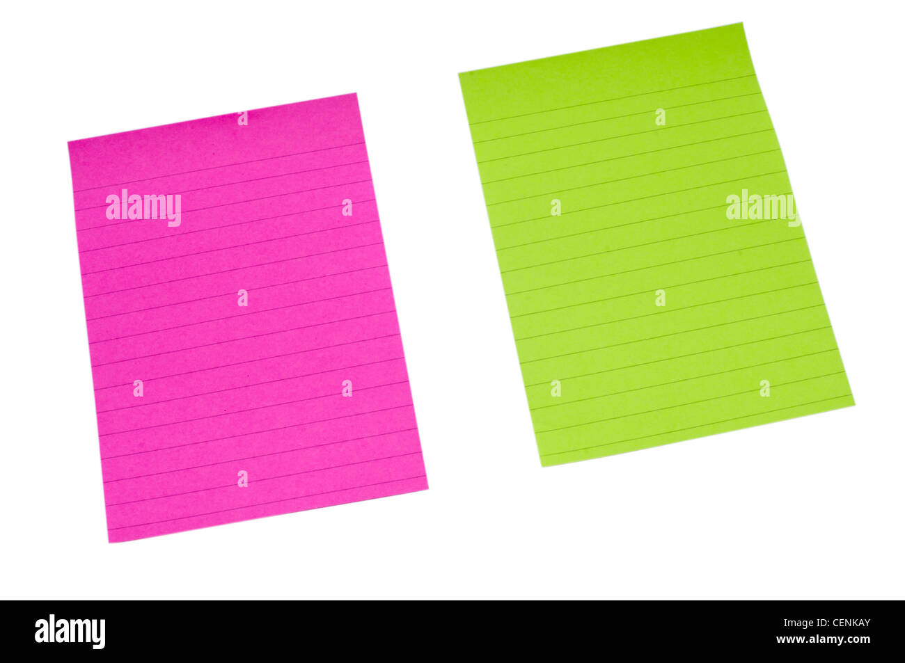 Blocchi appunti colorati su sfondo bianco: Cancelleria per ufficio rosa e verde Foto Stock