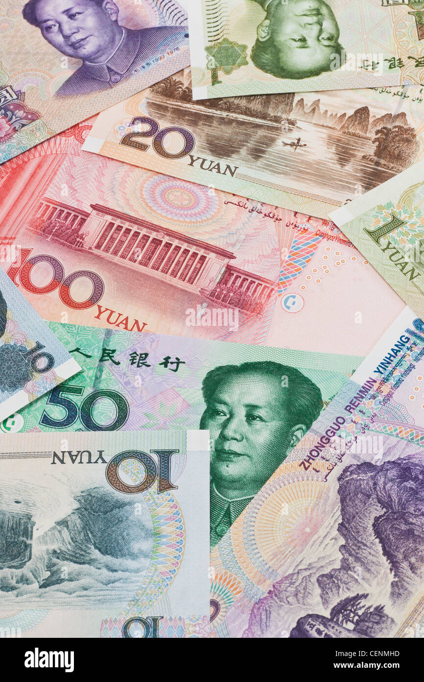 Molti Yuan fatture con il ritratto di Mao Zedong affiancati. Il renminbi, la valuta cinese, è stato introdotto nel 1949. Foto Stock