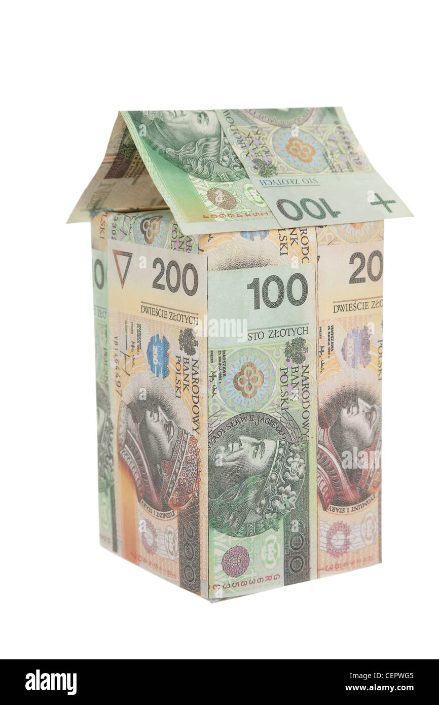 Casa fatta dal polacco soldi su sfondo bianco Foto Stock