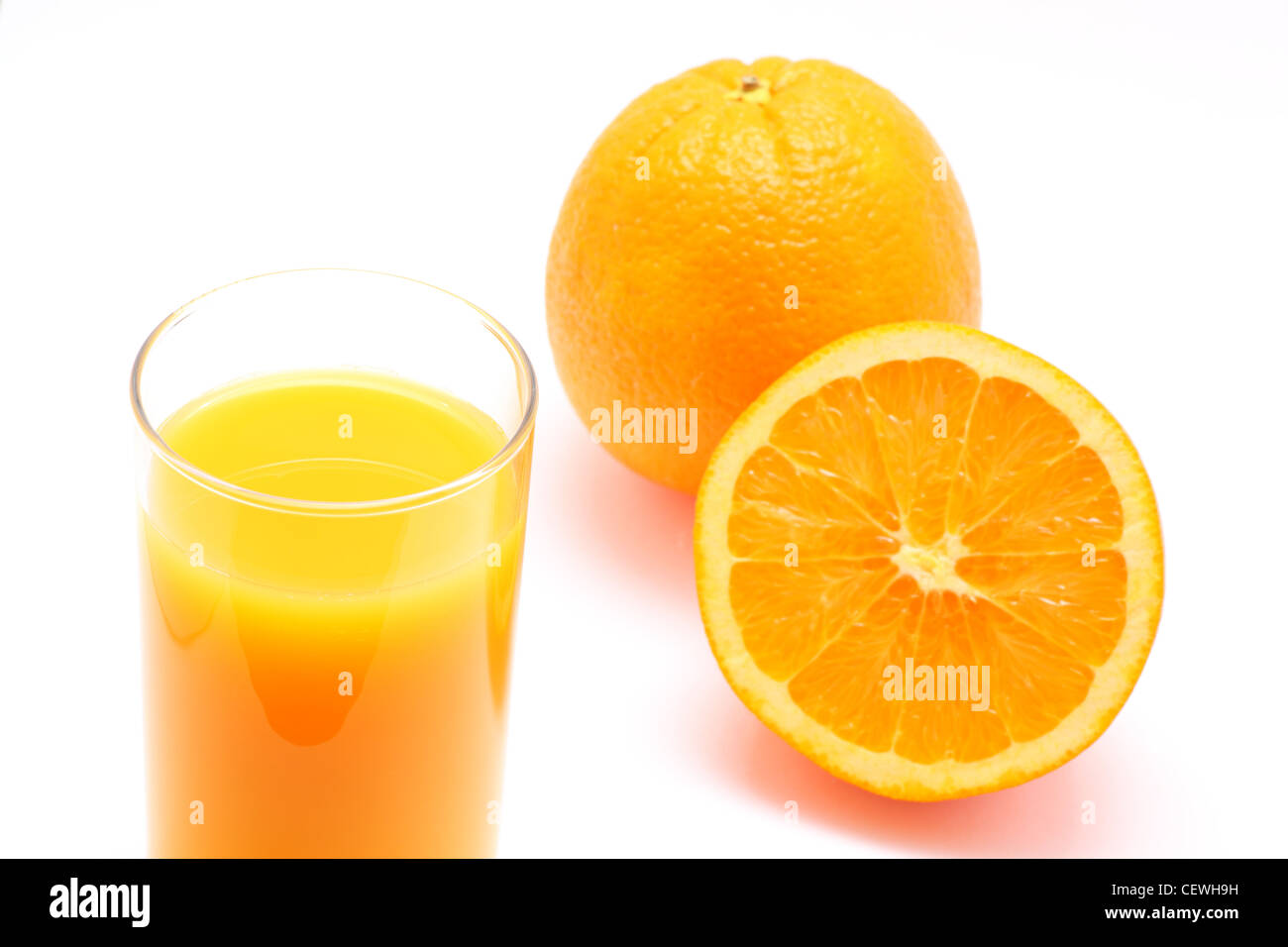 Arancia fresca frutta e succo di arancia Foto Stock