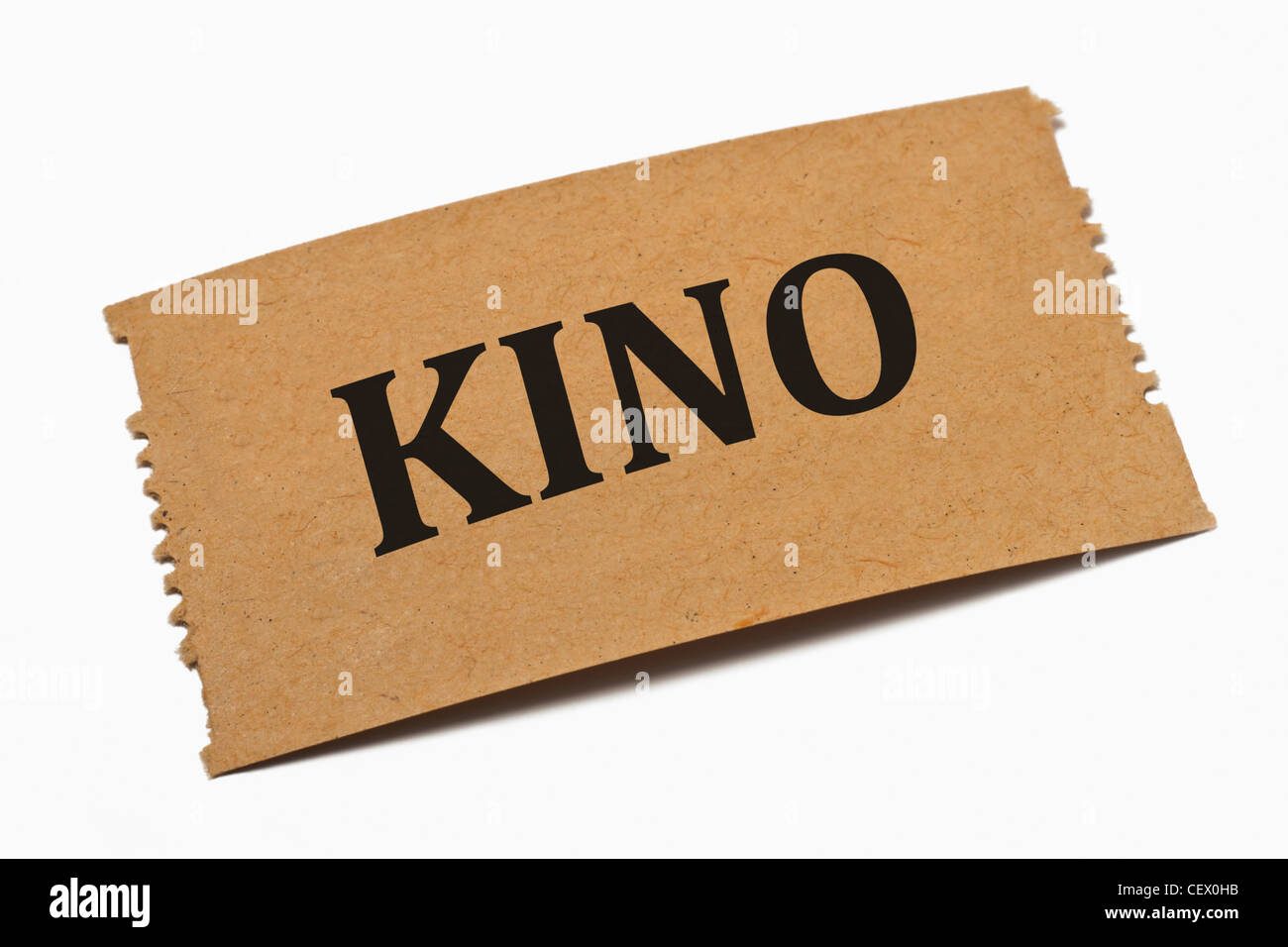 Detailansicht einer Karte aus Papier mit der Aufschrift Kino | Dettaglio foto di una scheda di carta con la scritta Kino (Cinema) Foto Stock