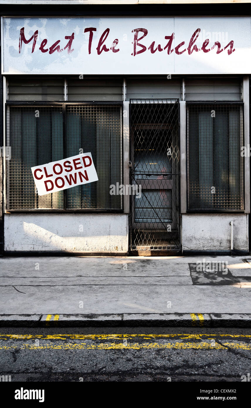 Macellerie negozio di fronte per un high street business che ha chiuso la nozione Foto Stock