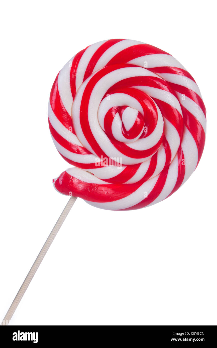 Bella lollipop con strisce rosse e bianche su sfondo bianco Foto Stock