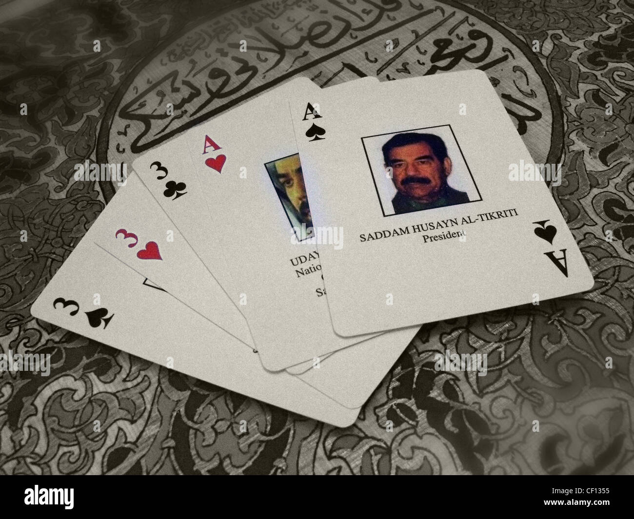 Saddam Hussein giocando a carte Ace Foto Stock