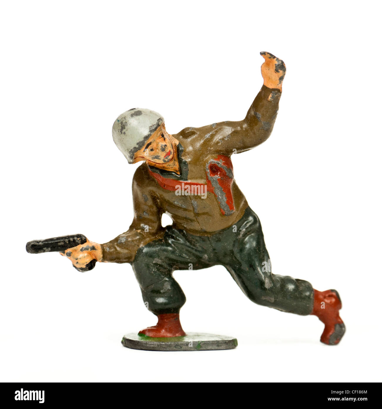 Vintage piombo soldato giocattolo chiamando i suoi uomini in avanti Foto Stock