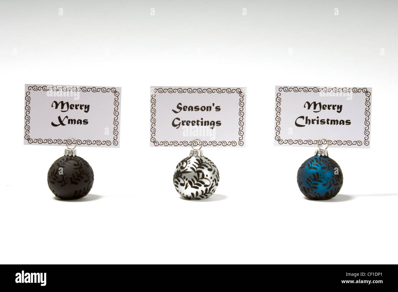 Nome ninnolo titolari di carta di credito con gli auguri di Natale Foto Stock