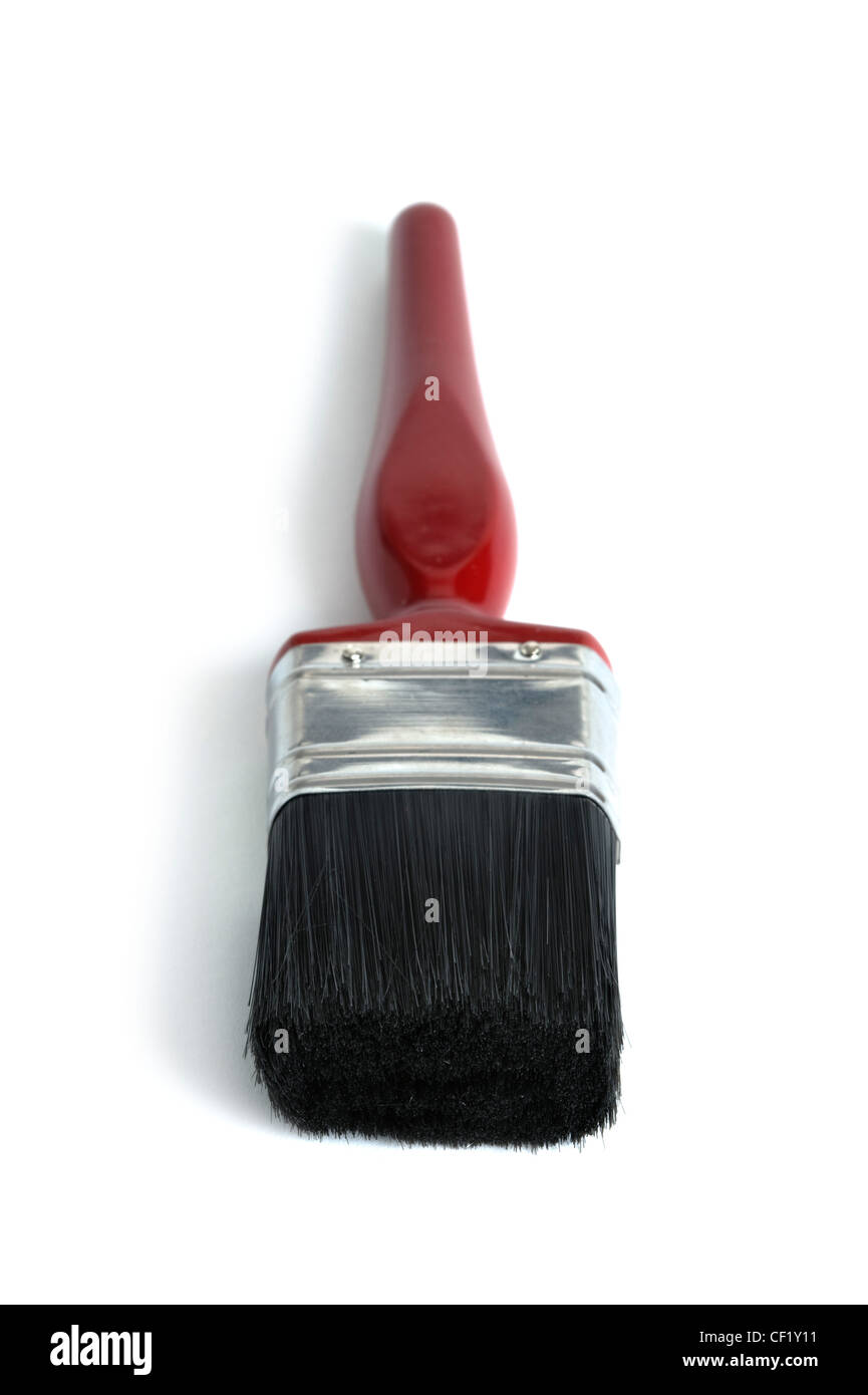Un singolo pennello rosso isolato su uno sfondo bianco Foto Stock